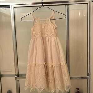 Flower girl dress, lace holder top champagne color. Never worn new with tags.